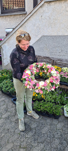 Blumenmädchen Floristik mit Herz